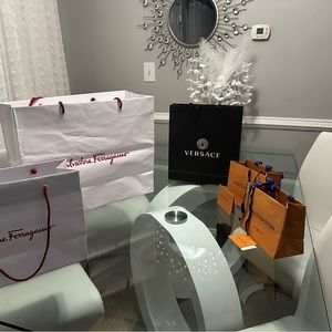 Signature shopping bags. Louis Vuitton + Versace+Salvatore Ferragamo.